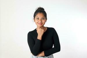 Young attractive Asian Indian woman pose face body expression mode emotion on white background hand on chin look at camera photo