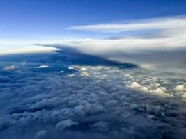 Sky Cloud through aircraft window photo