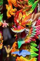 Georgetown, Penang, Malaysia-February 03, 2022- Colourful decorated prayer large joss sticks at Goddess of Mercy Temple. photo