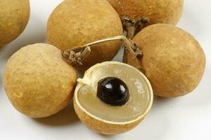 cats eye mata Kuching fruit on white backgroun d photo