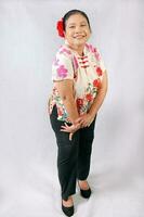 Elderly senior Asian woman posing facial expression photo