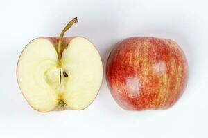 red apple whole half cut slice top view on white background photo