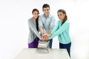 Yong south east Asian middle eastern Caucasian youth man woman in casual dress stand at table stack of book think rest tired look at camera on white background photo