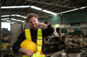 A technician with neck pain recurring when working long hours photo