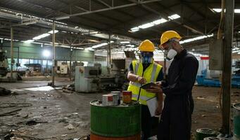 Scientists and government officials Inspect and collect chemical leak samples in industrial sites. to be thoroughly investigated in the laboratory photo