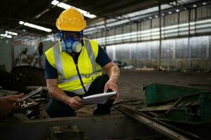 Scientists and government officials Inspect and collect chemical leak samples in industrial sites. to be thoroughly investigated in the laboratory photo