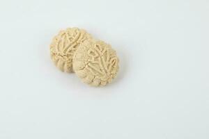 Decorative traditional biscuit on white background photo