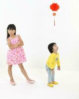 South East Asian young father mother daughter son parent boy girl child activity indoor photo