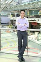 Young south east Asian middle eastern man woman business colleague outdoor stand pose photo