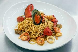 Serving Plating Seafood Lobster Spaghetti photo