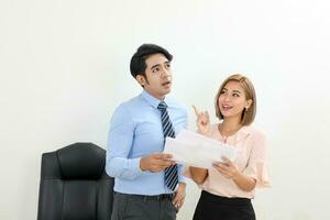Asian young man woman malay chinese office business talk discuss think document photo