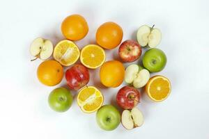 mix green red apple orange whole fruit cut slice half on white background photo