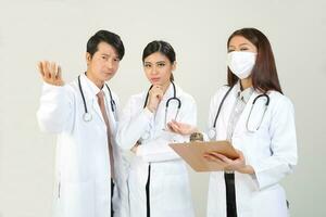 Young Asian male female doctor wearing apron uniform tunic apron hold photo