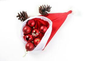 Christmas Hat Red Ornament Decoration on white background photo