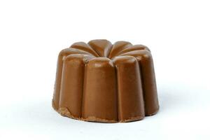 Chocolate truffle hart square cube rose flower shape on white background photo