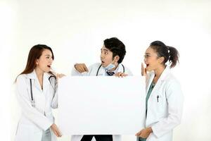 Asian Chinese Malay male female doctor holding posing showing pointing blank expression happy exited white paper board on white background photo