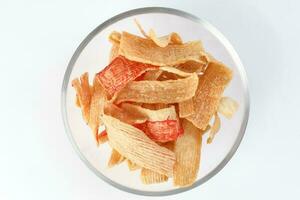 CNY crab chips snack glass bowl white background photo