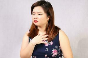 Young attractive southeast Asian woman posing facial expression sad photo