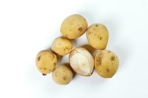 Lansium parasiticum langsat lanzones on white background photo