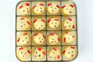 Chinese New Year rat mouse shaped cookie on tray photo