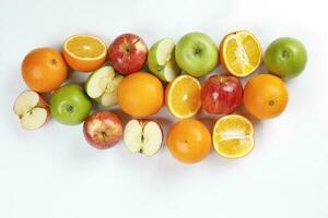 mix green red apple orange whole fruit cut slice half on white background photo