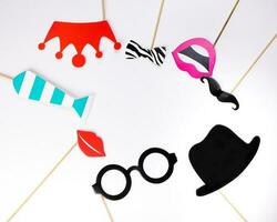 Black round eyewear spectacle frame hat moustache blue neck tie red crown lip smile shape paper die cut selfie portrait party fun paper prop sticker stick on white background photo