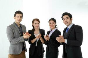 Southeast Asian middle eastern Caucasian young office business man woman wearing suit stand clapping hand unity togetherness confident happy success expression on white studio background photo