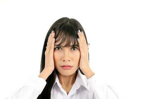 Facial Expression Young Asian woman office attire white background headache hand on head photo