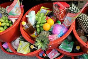 Kuala Sepetang, Taiping, Malaysia- August 18, 2019- Offerings outside the market on occasion of 7th Lunar month for the Chinese is the opening of the hell gate Hungry Ghost Festival. photo