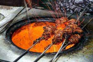 Tandoori Chicken cooked fire photo