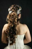 Hair style fashion white dress on black background photo