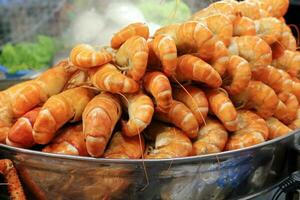 Fresh prawn shrimp BBQ grill at street side food stall photo