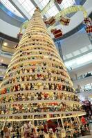 Kuala Lumpur, MALAYSIA  December 11, 2018 In calibration of 90 years of Mickey Mouse, the Christmas tree decoration at Pavilion, Bukit Bintang is grand as it can be. photo