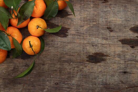 mandarin orange green leaf wood crate box top view copy text space frame on rustic wooden background photo