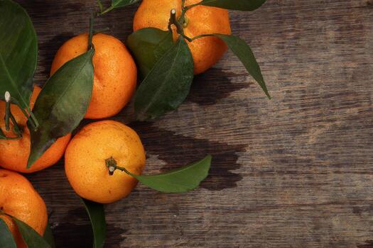 mandarin orange green leaf wood crate box top view copy text space frame on rustic wooden background photo