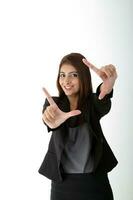 Asian young Indian woman wearing formal business office ware on white background finger hand frame face photo