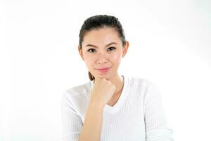 beautiful young south east Asian Chinese woman hand on cheek chin on white background photo