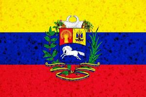 bandera de el Venezuela en un texturizado antecedentes. concepto collage. foto