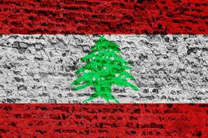 Flag of the Republic of Republic of Lebanon on a textured background. Concept collage. photo