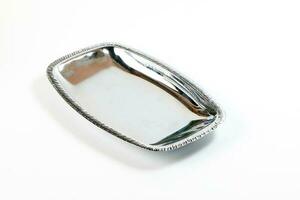 Silver tray plate on white background photo