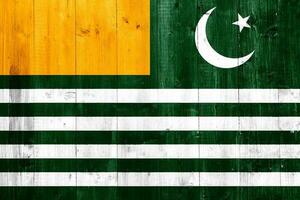 Flag of Azad Kashmir on a textured background. Concept collage. photo