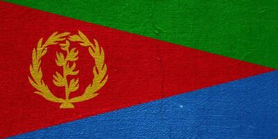 Flag of State of Eritrea on a textured background. Concept collage. photo