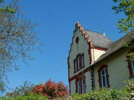 The small city of Saarburg at the saar river in germany photo