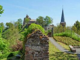 The small city of Saarburg at the saar river in germany photo