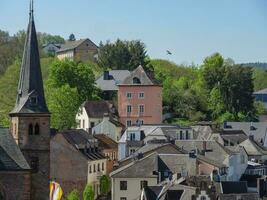 The small city of Saarburg at the saar river in germany photo