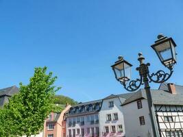 The small city of Saarburg at the saar river in germany photo