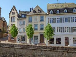 The small city of Saarburg at the saar river in germany photo