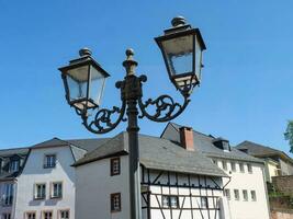 The small city of Saarburg at the saar river in germany photo