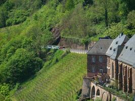 The small city of Saarburg at the saar river in germany photo