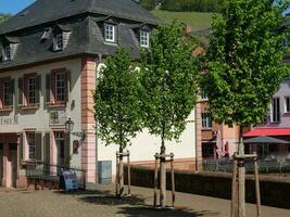 The small city of Saarburg at the saar river in germany photo